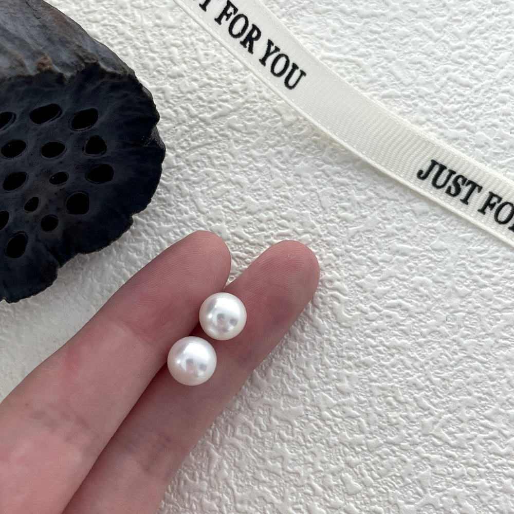 
                      
                        Classic Natural Pearl Stud Earrings
                      
                    