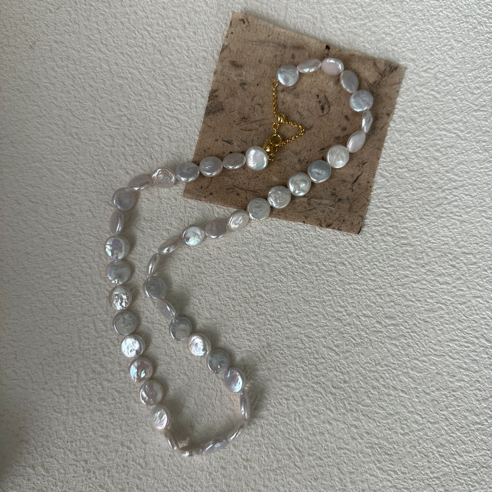 
                      
                        Small Round Natural Baroque Pearl Necklace
                      
                    