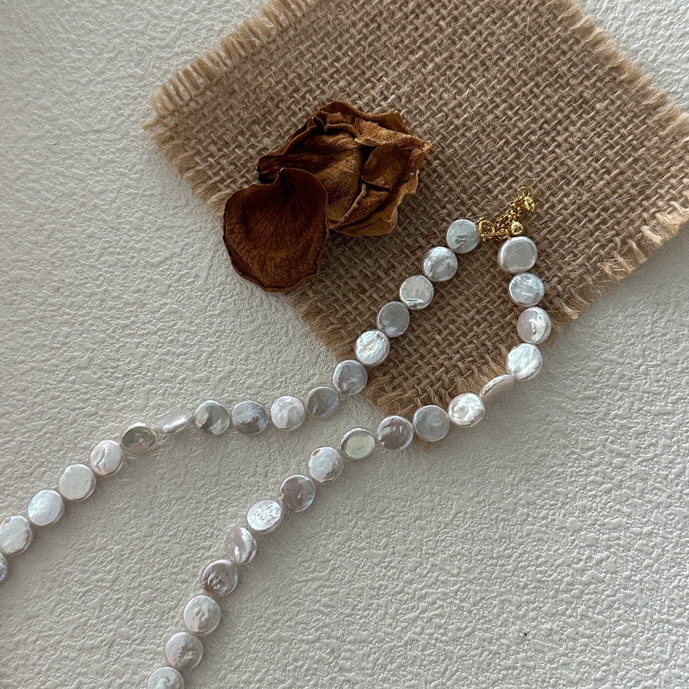 
                      
                        Small Round Natural Baroque Pearl Necklace
                      
                    