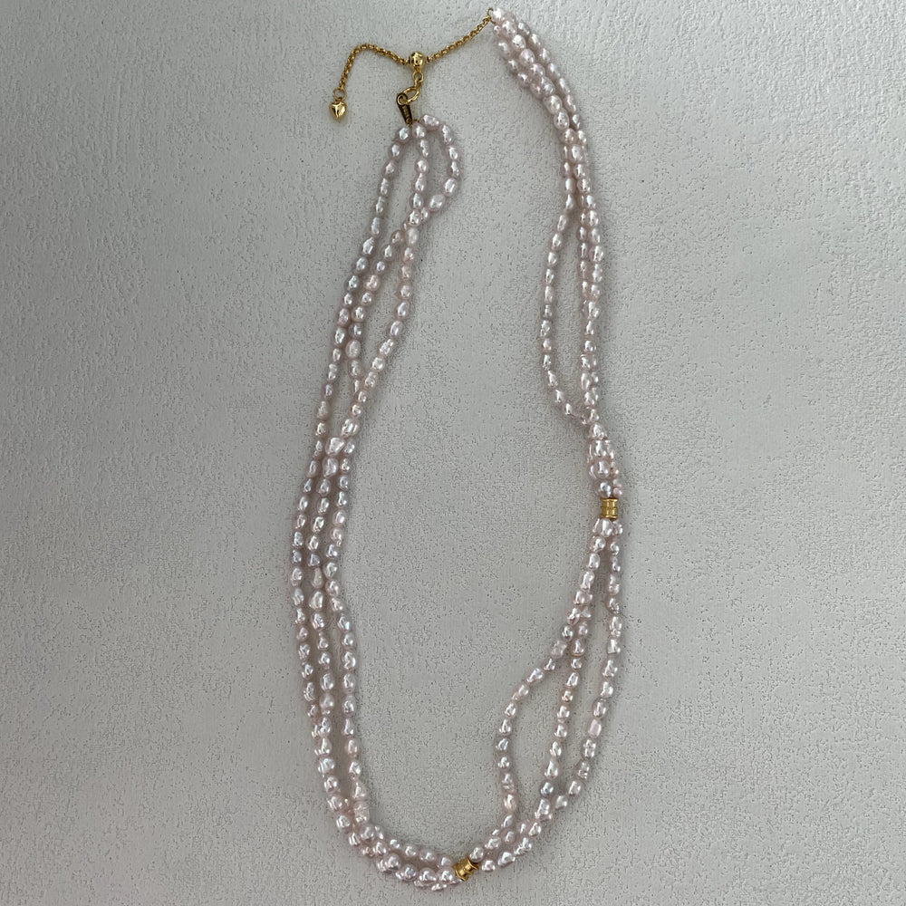 
                      
                        Triple-Strand Natural Pearl Necklace
                      
                    