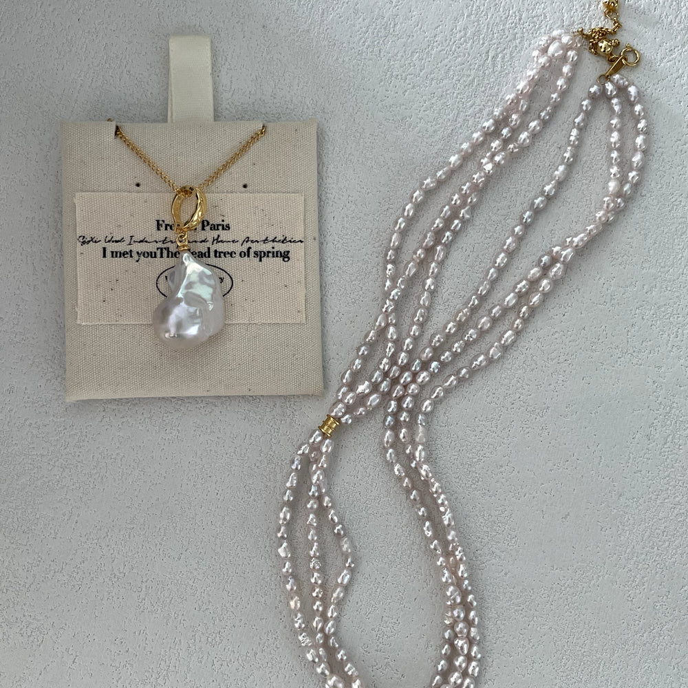 
                      
                        Triple-Strand Natural Pearl Necklace
                      
                    