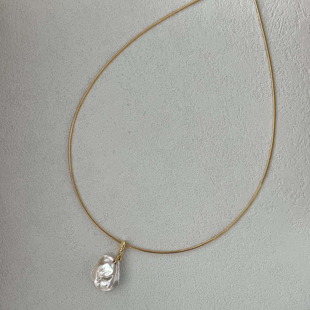 
                      
                        Petal Natural Pearl Necklace
                      
                    