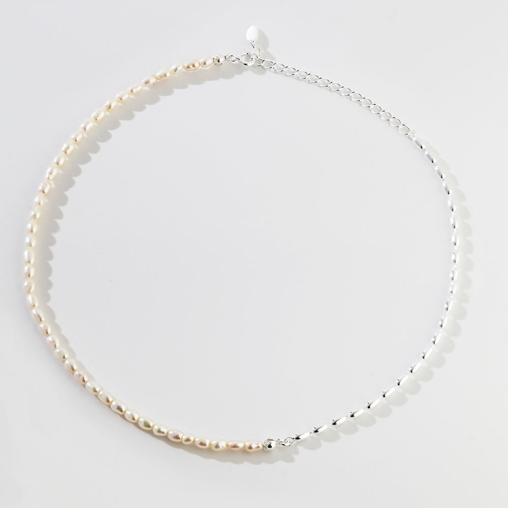 
                      
                        Natural Rice Pearl Necklace
                      
                    