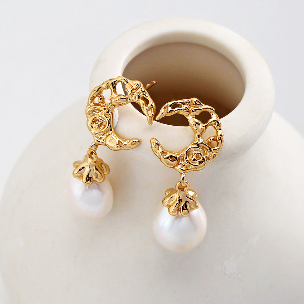 
                      
                        Crescent Hollow Natural Pearl Earrings
                      
                    